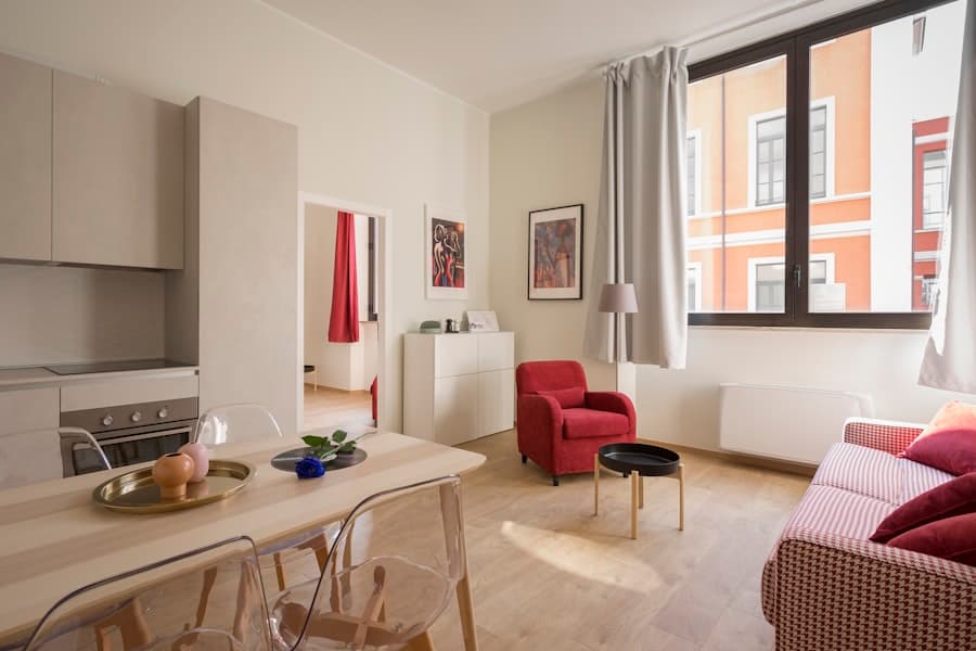 Bright fully furnished studio apartment with kitchen and living area